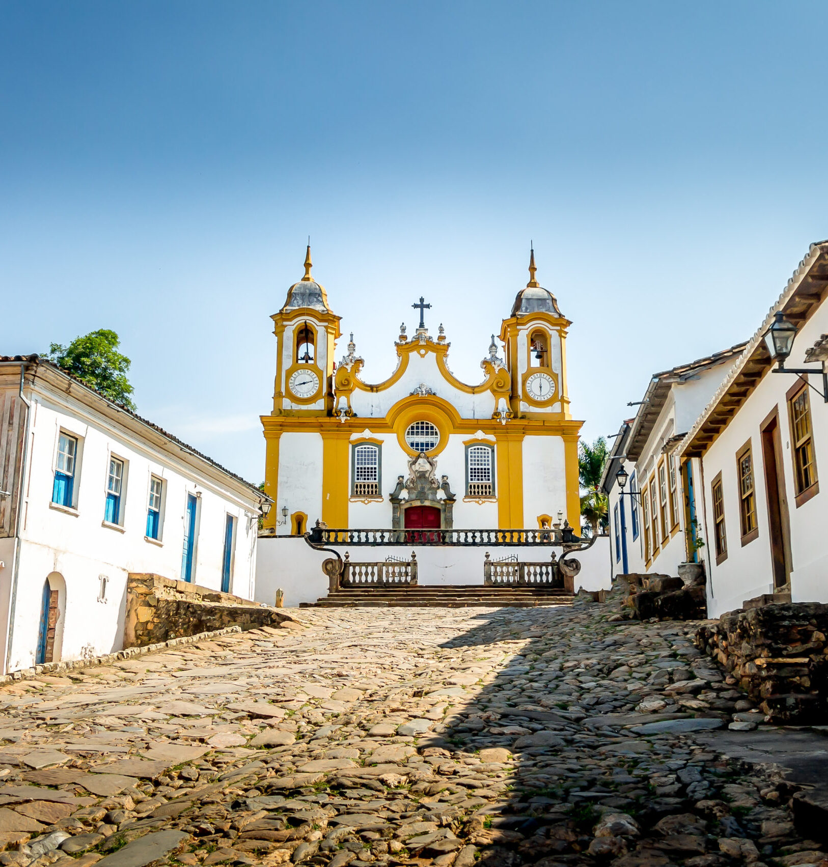 Colorful colonial houses and church in city of Tiradentes - Mina